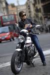 A different woman with a Guzzi V7 Classic, but that's okay because this one's more fit.