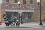 Standing on corner in Winslow Arizona. From the Eagles song... okay, tacky, but pretty well done, the whole scene at the back is painted.