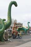 Shop selling pieces of petrified wood. And a row of dinosaurs...