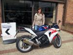 Caroline with her bike loaned for the weekend